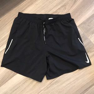 Men’s black dry fit shorts.